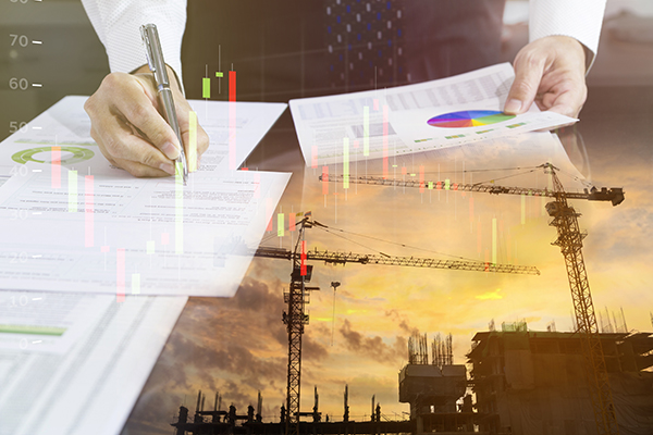 Businessman signing a building construction contract